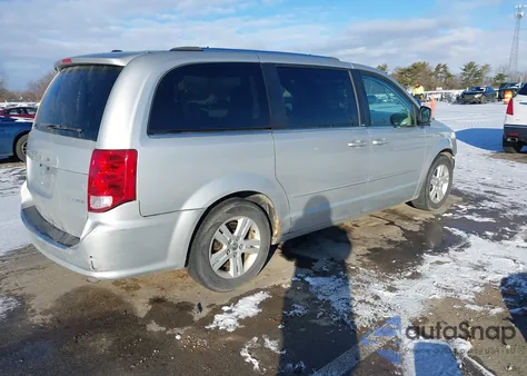 2012 Dodge Grand Caravan Crew z USA, uszkodzony, nr VIN 2C4RDGDG7CR231127